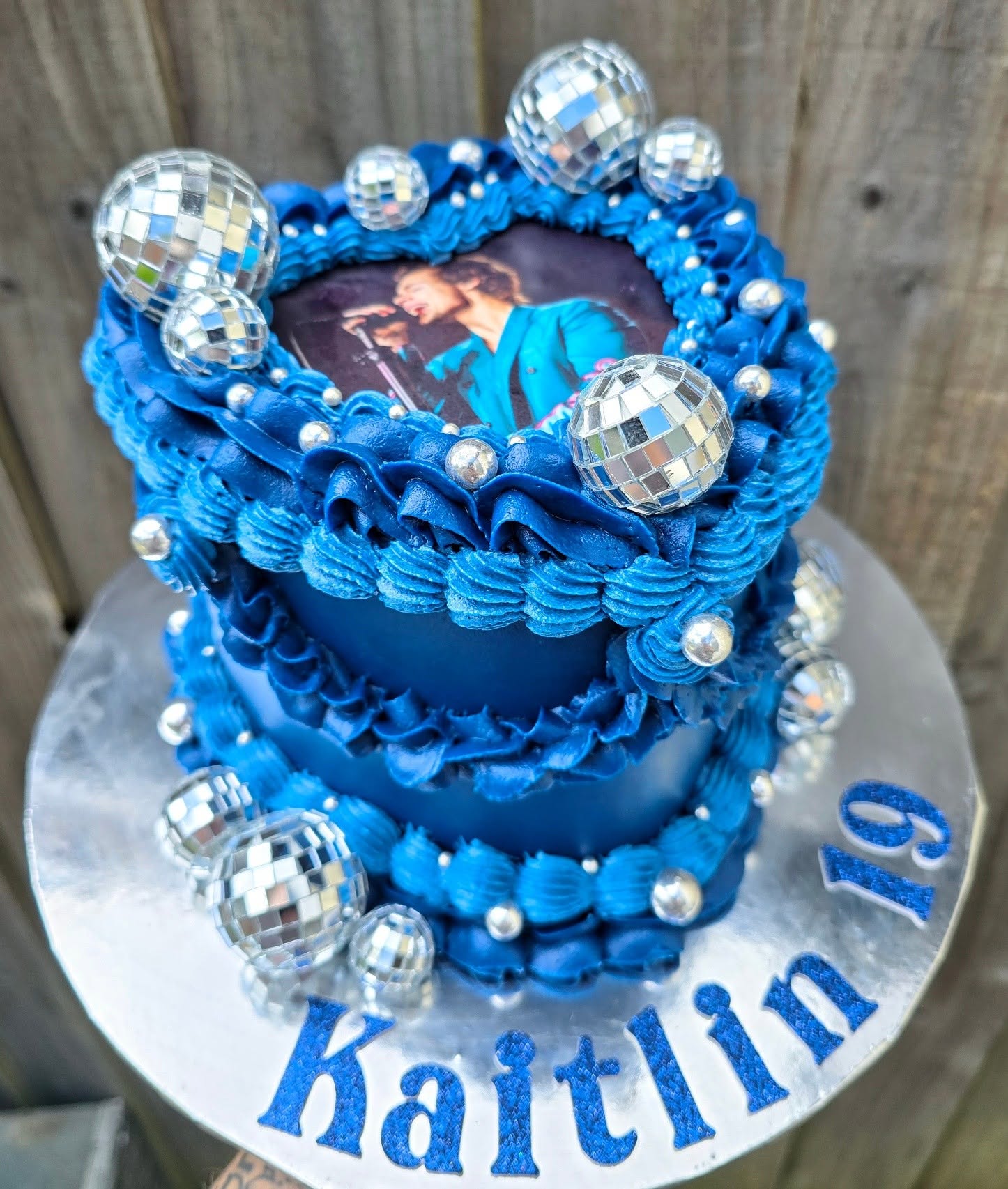 Bright blue piping, disco balls and a personalised finish.